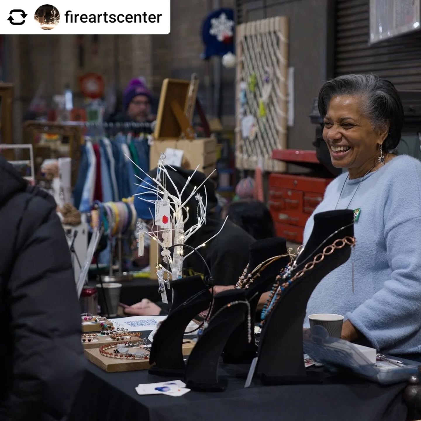 Get @reshare_app • @fireartscenter Saturday's Red Hot Art Market saw over three dozen vendors, hundreds of shoppers, and over $6,000 raised for scholarships - nearly meeting the record set at last year's market!

Thank you to everyone who came and participated, whether it was to buy gifts or enjoy some hot chocolate ❤️‍🔥

[ID: 1. A person wearing a blue sweater smiles standing behind a table with a range of necklaces and other jewelry 2. A person wearing a plaid scarf looks down at art on a table. In the foreground is a small tree with ornaments and lights on it. 3. A top-down photo of vendors and market visitors along with tables set up with pottery, prints, jewelry, fiber arts, clothing and more. 4. Two people - one artist sitting at a table with small forged pieces, and a standing market visitor - smile at each other. 5. A close up photo of a hand holding a silver ring. Other rings of various designs and patterns are visible in a box on the table.]

#firearts #heatsparkflame #redhotartmarket #jewelry #prints #pottery #glass #metal #fiberarts #gifts #market #fundraiser #scholarships
